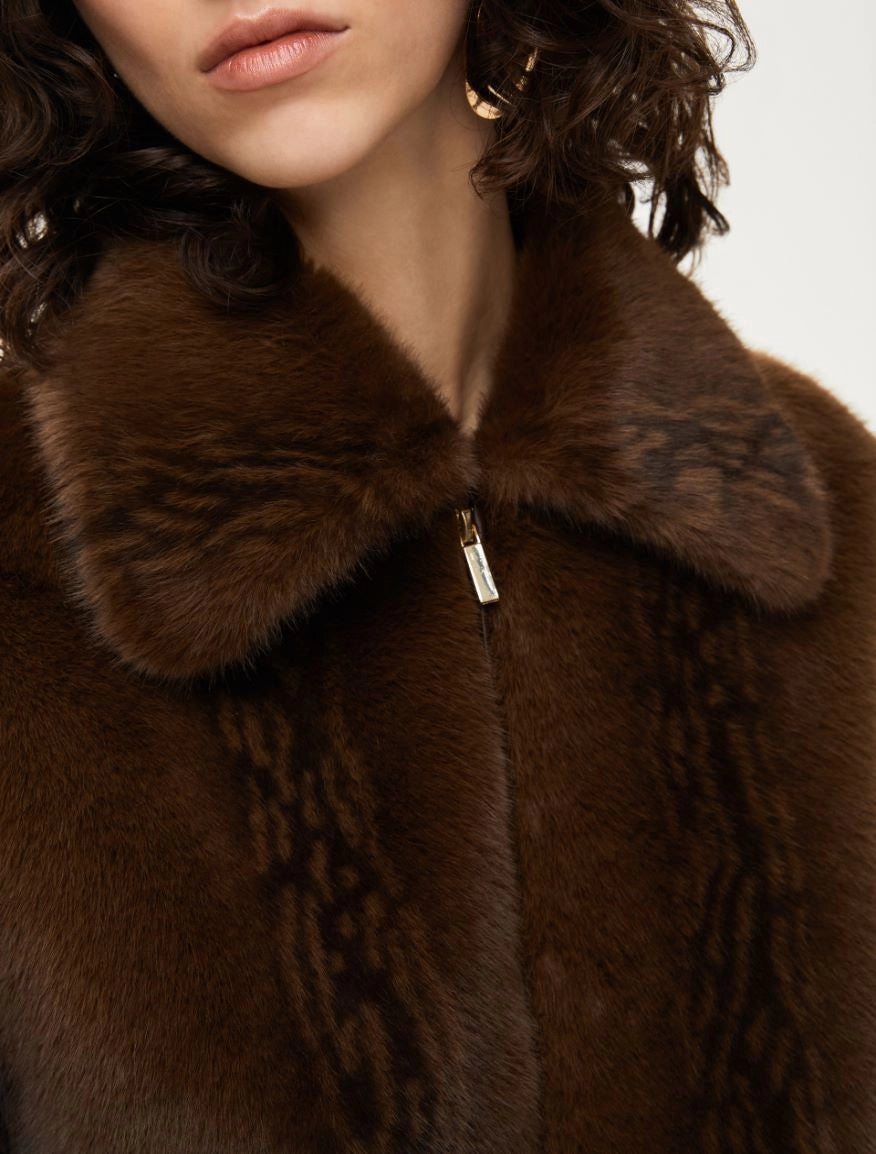 Close up of collar of faux fur jacket 