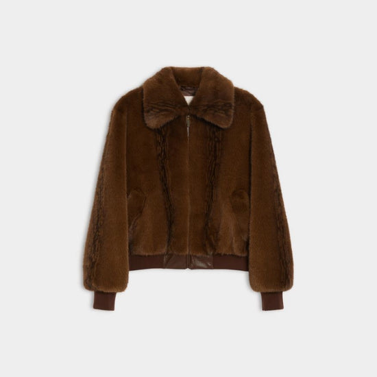 Brown faux fur jacket on a white background
