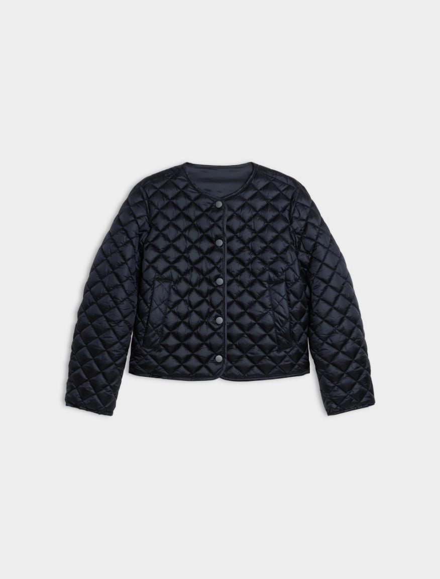 navy quilted coat on white background