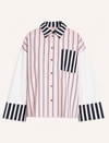 A long-sleeve button-up shirt with a pink and white vertical stripe body, contrasting black and white striped collar, chest pocket, and cuffs, displayed on a light cream background.
