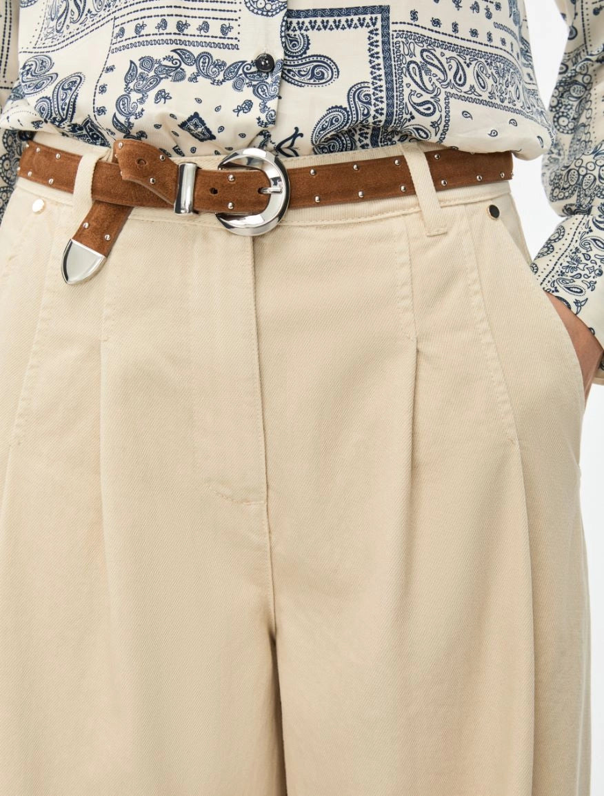 tan leather belt with silver studs and buckle from iblues model shot