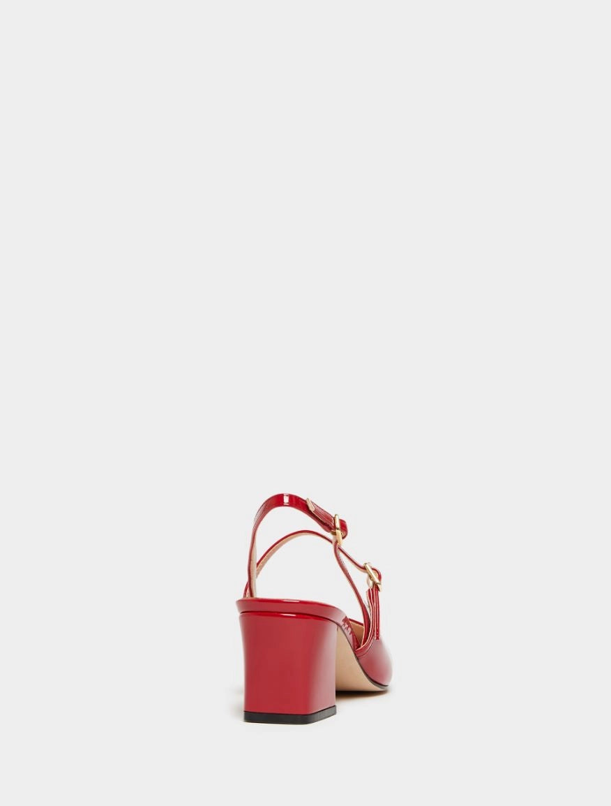red patent leather square toe mary jane heels with slingback and strap over the foot from iblues rear view