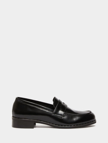black leather loafers with small heel and metallic dot detailing along the edging form iblues