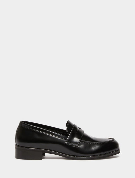black leather loafers with small heel and metallic dot detailing along the edging form iblues