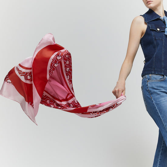 Printed silk square with heart design in red and pink