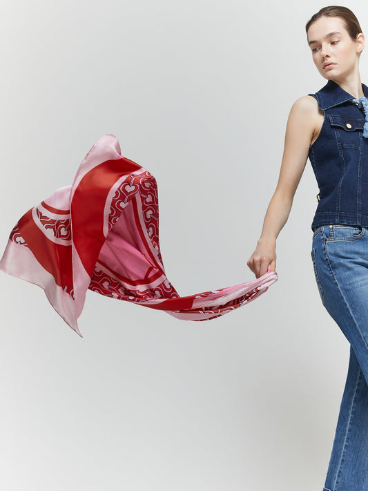 Printed silk square with heart design in red and pink