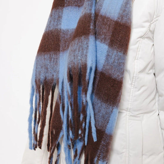 blue and brown check scarf with fringe detail close up