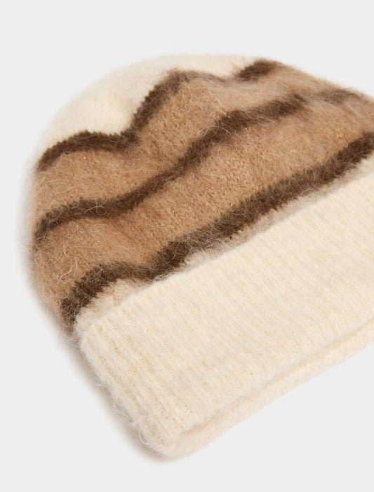 brown and cream stripe beanie on white background close up 