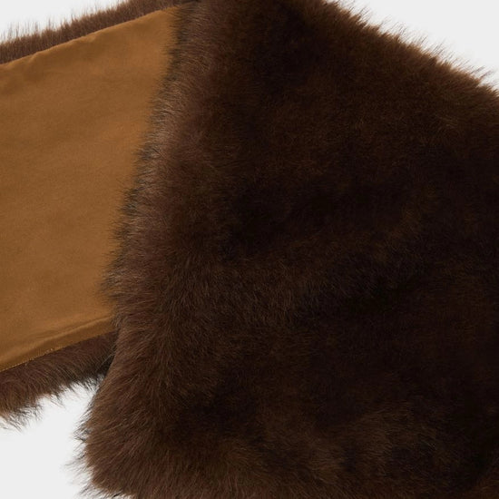 chocolate brown faux fur scarf folded to show satin side