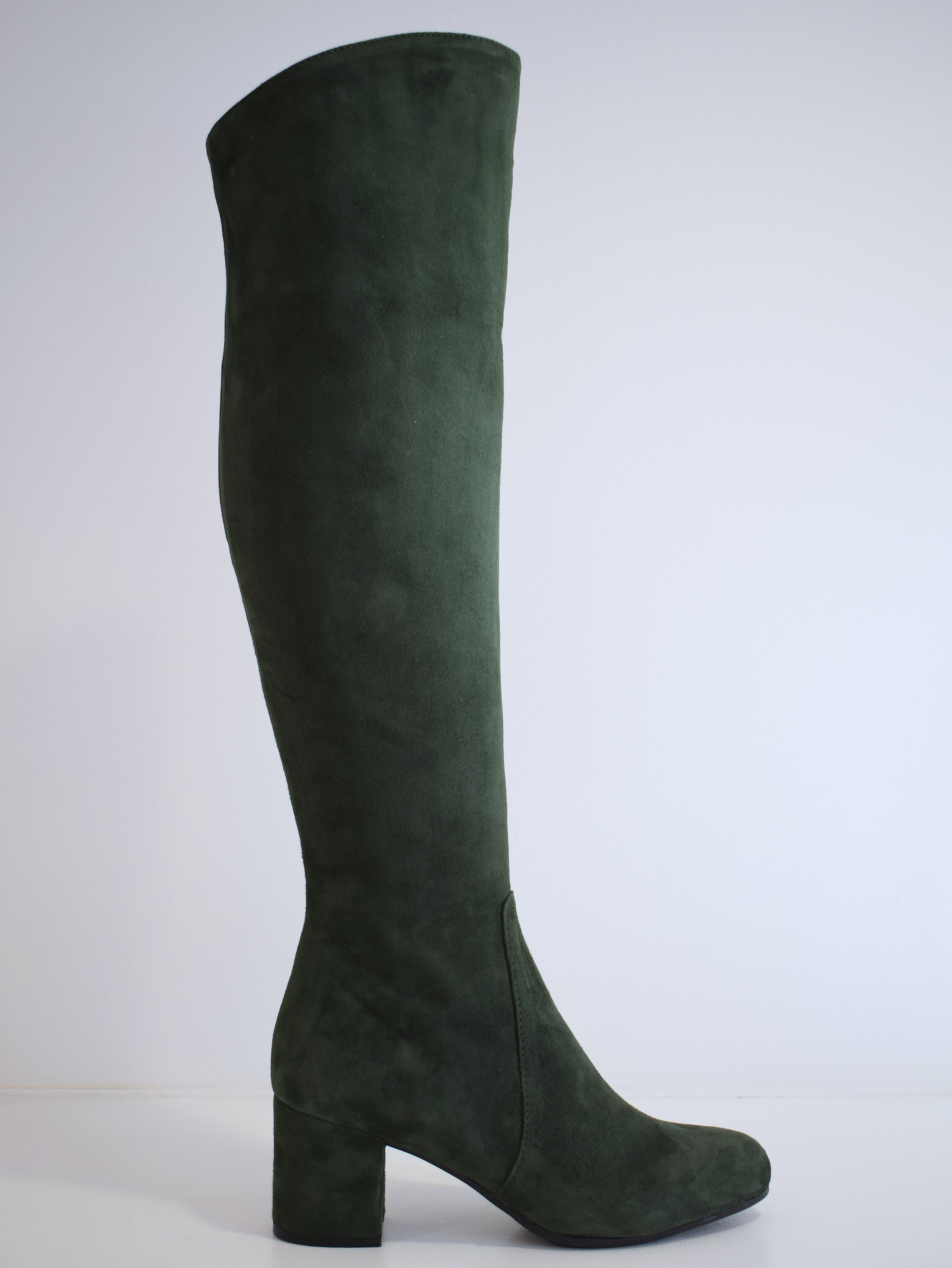 Tall green suede boot with block heel and inside zip fastening