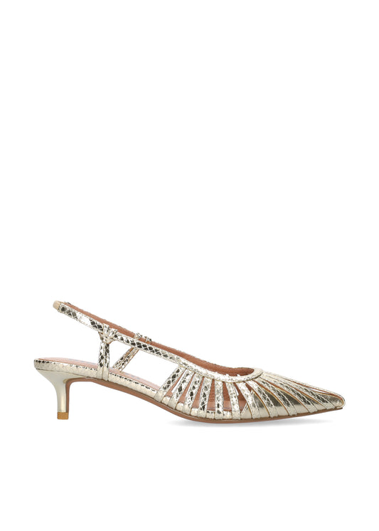Gold high-heeled shoe with embellishments on a white background