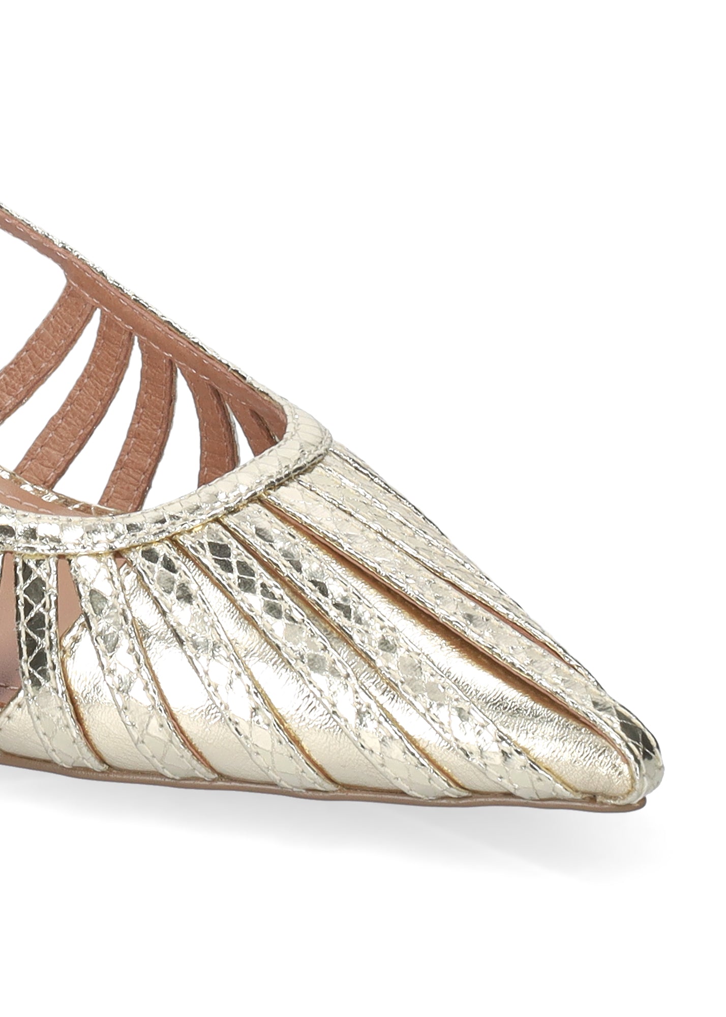 Gold and bronze pointed-toe shoe on a white background