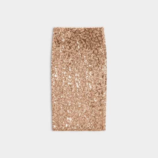 A rectangular swatch of rose gold sequin fabric, centered on a light gray background.