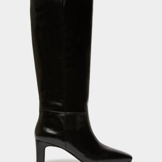 Black high leather boot on white background