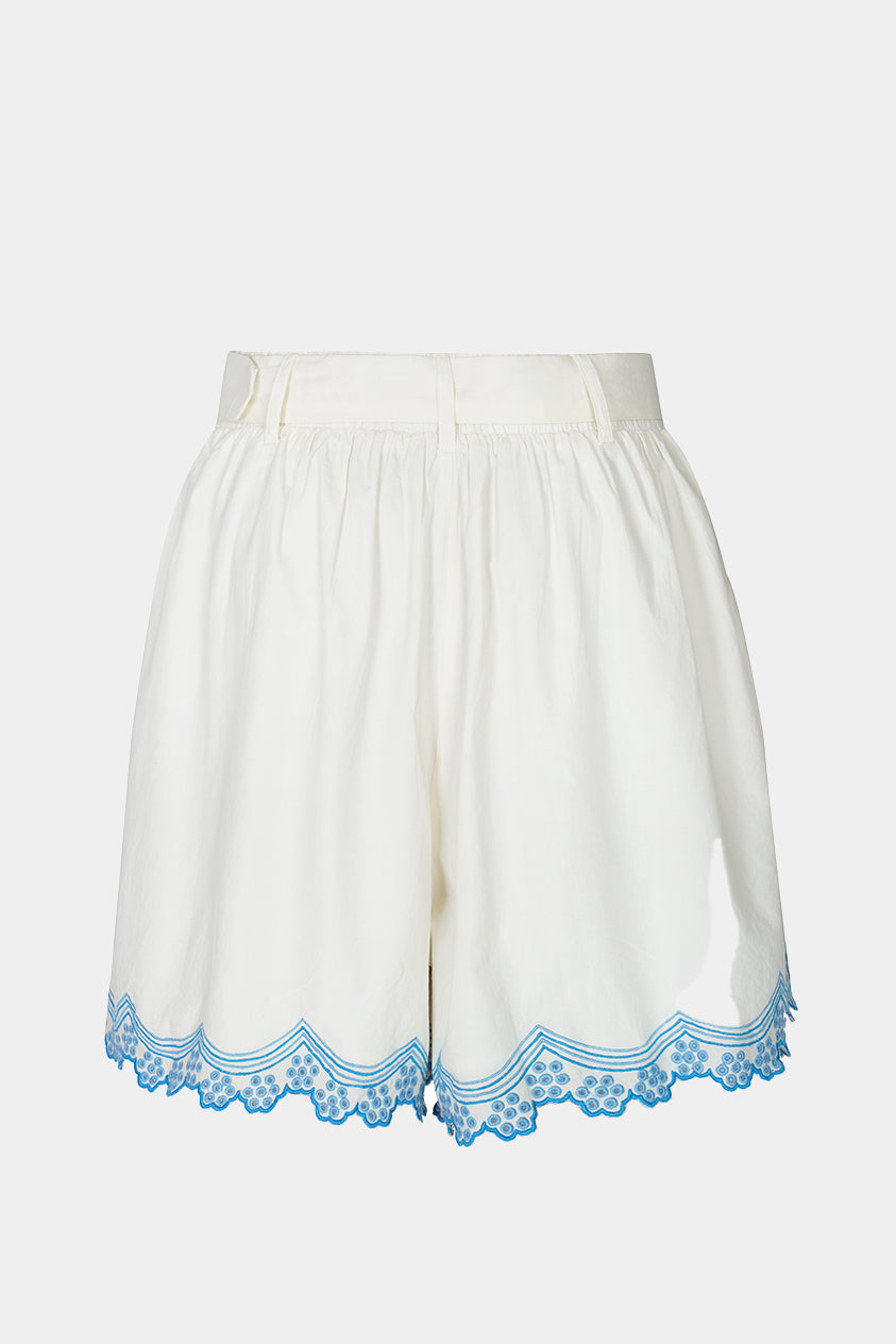 White shorts with blue lace trim on a white background