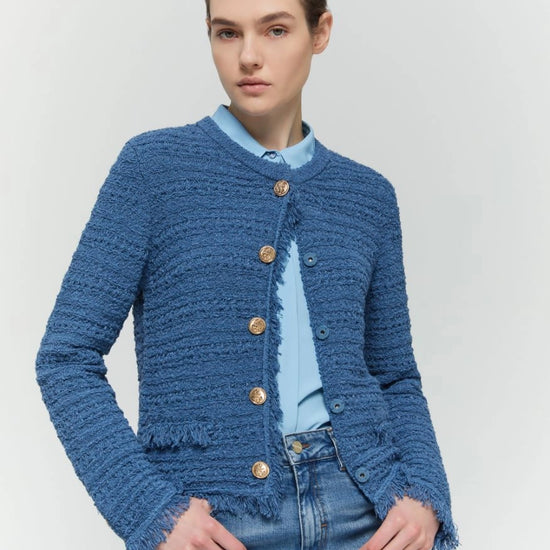 blue cotton blend cardigan with fringe detail, gold buttons and round neck model shot