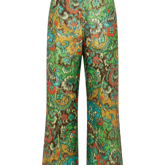 A pair of wide-leg cropped pants featuring a vibrant, multicolored paisley pattern with green, yellow, orange, and blue tones, set against a plain white background.
