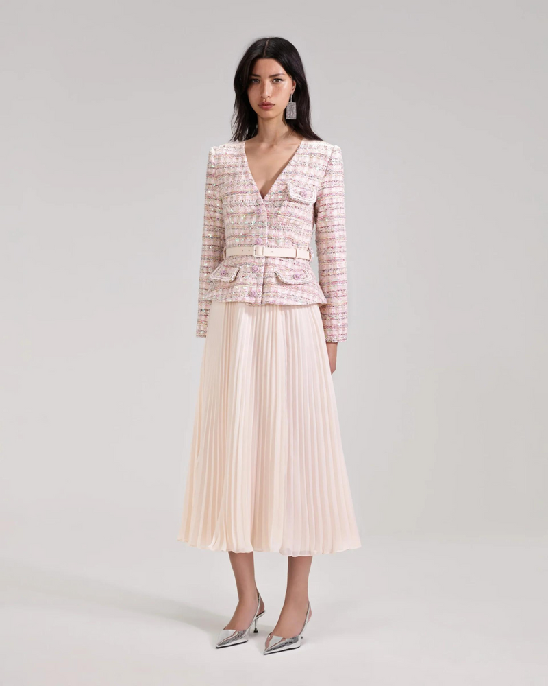 Shimmery pink boucle fitted collarless jacket with V neck detachable belt with soft pink pleated midi skirt