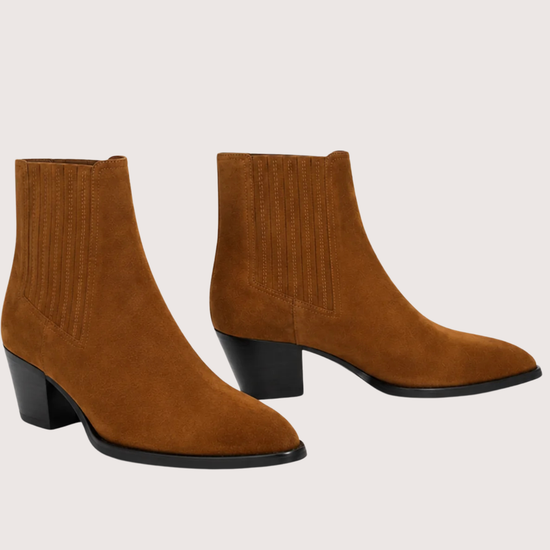 A pair of women's brown suede ankle boots with black block heels, shown from the front and side angles against a light beige background.