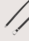 Black belt with silver buckle on a light gray background