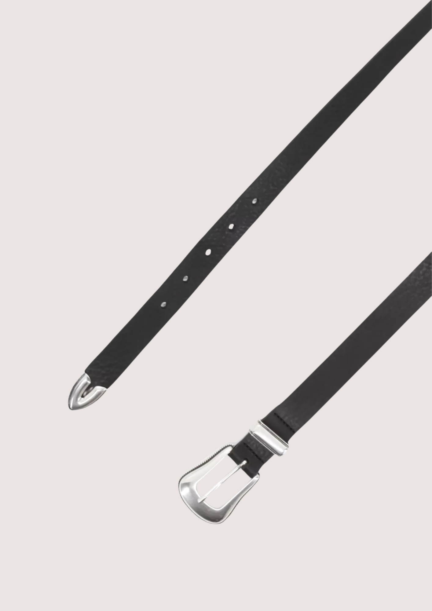 Black belt with silver buckle on a light gray background