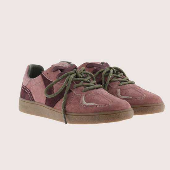 A pair of low-top suede sneakers in dusty rose and dark burgundy, featuring olive green laces and a light brown gum sole, shown against a plain light beige background.