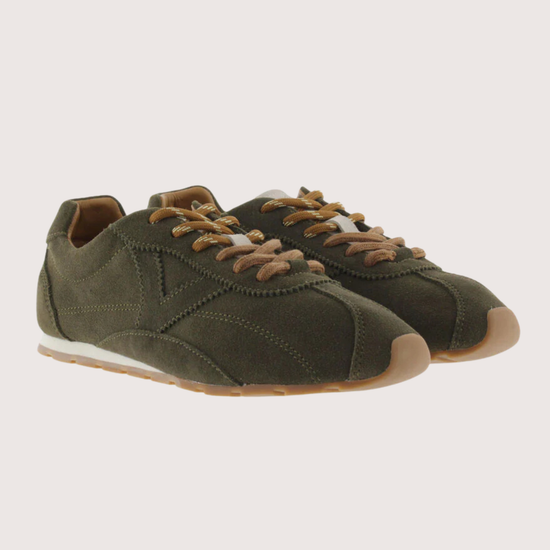 Khaki suede sneaker with beige sole on a plain background