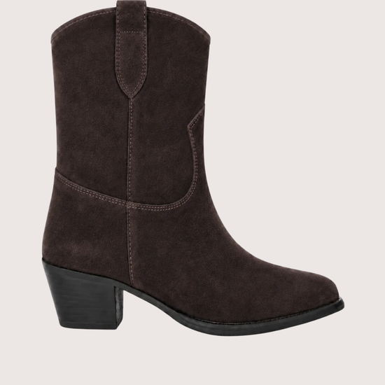 A dark brown suede western-style ankle boot with a low block heel, shown from a side profile against a light gray background.