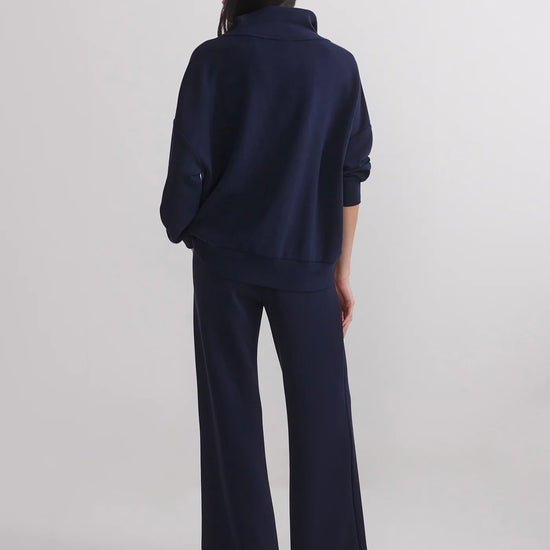 extra wide leg navy elasticated waistband trousers from varley model shot rear view