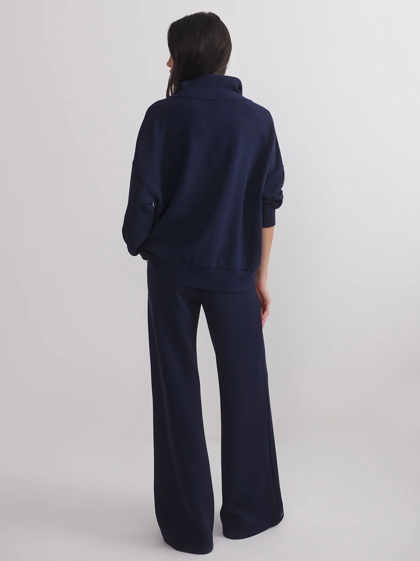 extra wide leg navy elasticated waistband trousers from varley model shot rear view