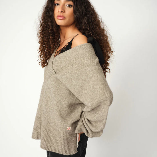 v neck cross over neck grey melange wool mix jumper with relaxed fit from heyanno side view 