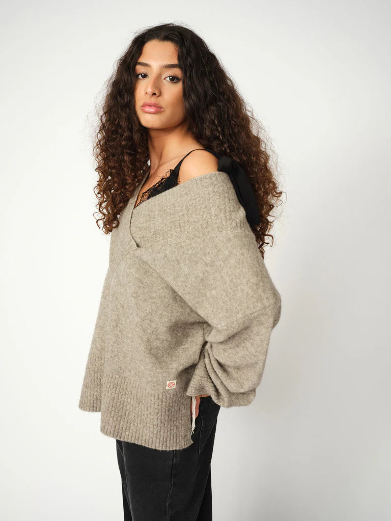 v neck cross over neck grey melange wool mix jumper with relaxed fit from heyanno side view 