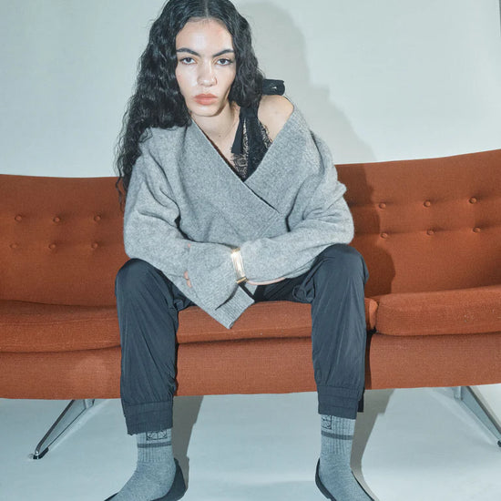 v neck cross over neck grey melange wool mix jumper with relaxed fit from heyanno mode shot