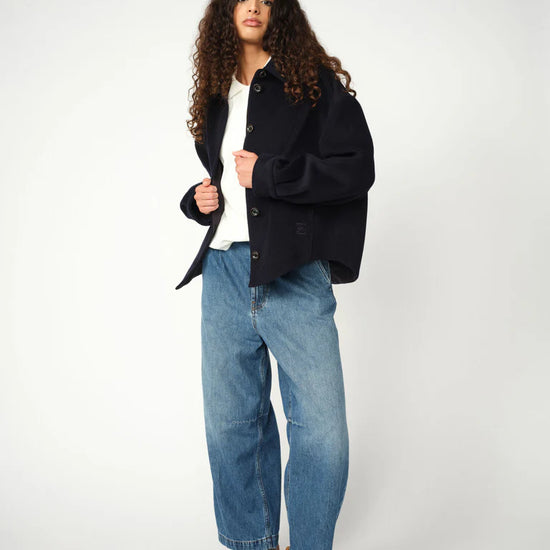 navy blue jack with collar, large buttons and oversized fit from heyanno model shot