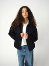 navy blue jack with collar, large buttons and oversized fit from heyanno model shot