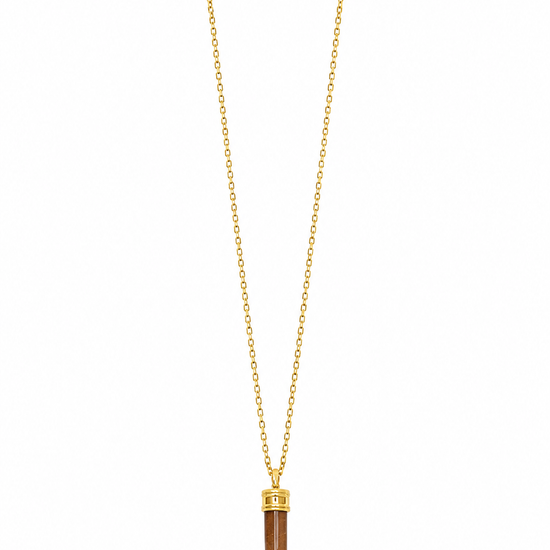 A gold chain necklace featuring a long, curved brown bone or horn pendant with gold caps at the top, displayed on a clean white background.