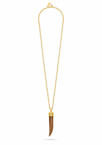 A gold chain necklace featuring a long, curved brown bone or horn pendant with gold caps at the top, displayed on a clean white background.