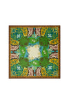A square scarf with an intricate botanical and floral pattern, featuring shades of green, yellow, brown, and blue, with a central cream-colored square.