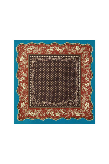 A square bandana scarf with a traditional paisley pattern, featuring a dark brown center, a red border with cream floral details, and a solid turquoise blue outer border, shown flat against a white background.