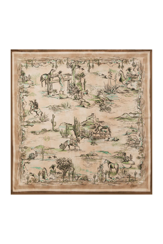 A square scarf featuring a detailed western-themed toile de Jouy print with horses, riders, cacti, and rustic figures in muted green and brown tones on a warm beige background, finished with a brown border.