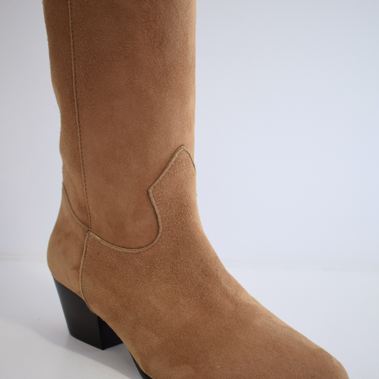 Sand coloured medium length pull on suede western inspired boot