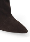 Close-up of a dark brown suede boot with a pointed toe on a white background.