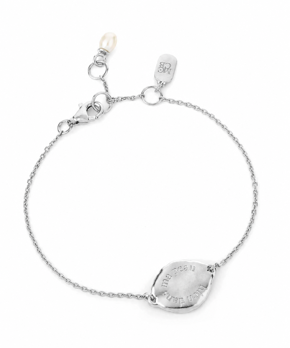 flat lay image of a silver bracelet