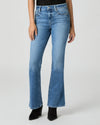 Blue jeans by Paige worn by a person on a white background