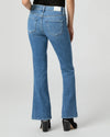Blue jeans by Paige worn by a person on a white background rear view
