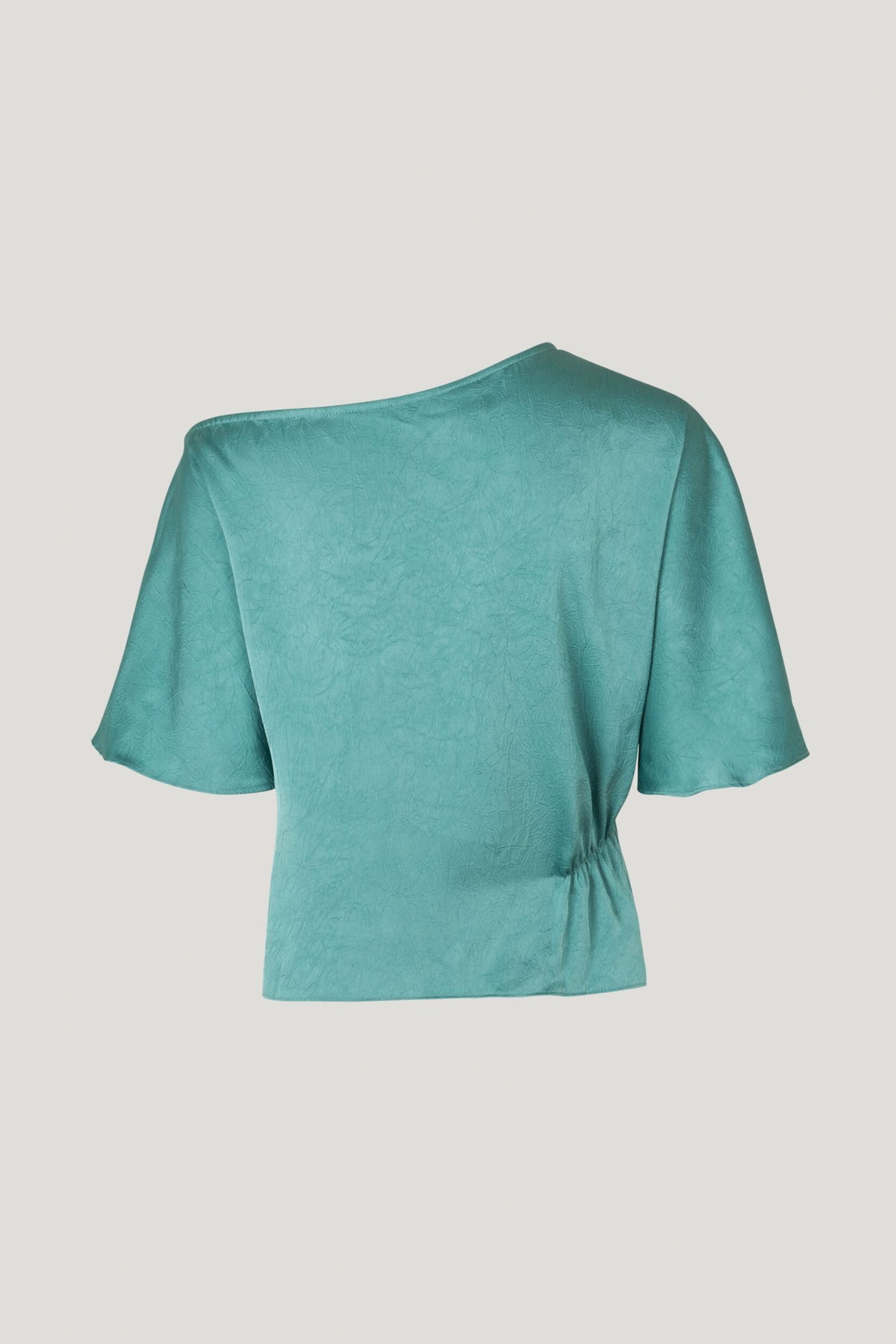 Asymmetrical blue green textured satin short sleeved top with elasticated side detail