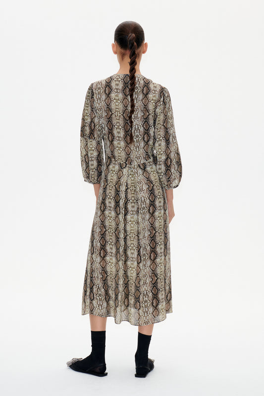 Snake print midi dress with crew neckline and bracelet length sleeves