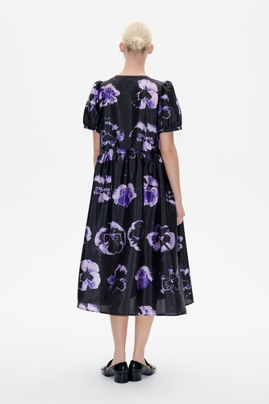 Black midi full dress with purple pansies short puff sleeves and round neck