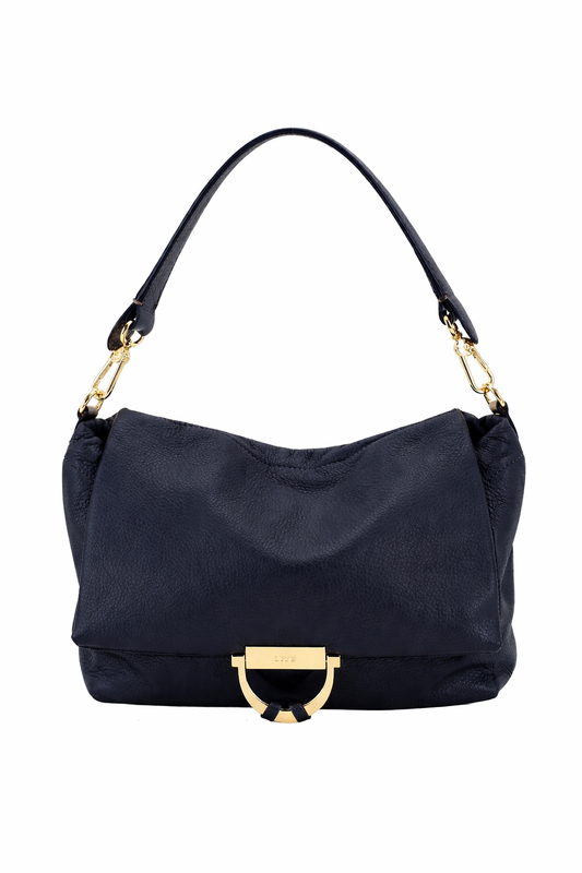 Navy handbag with gold accents on a white background