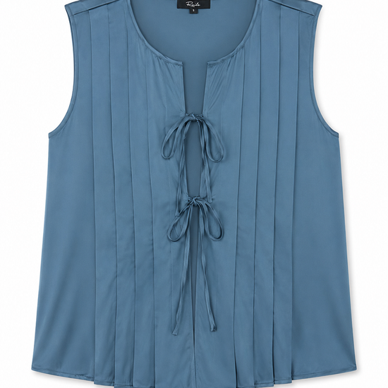 flat lay of a blue satin tie front sleeveless top on a white background 